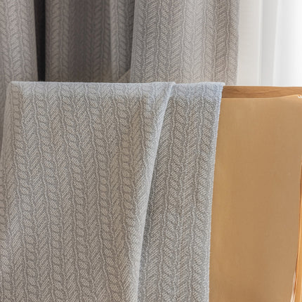 a chair with a blanket on top of it