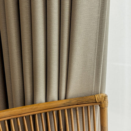 a close up of a bamboo bed frame
