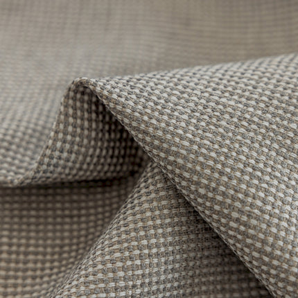 a close up of a gray and white checkered fabric