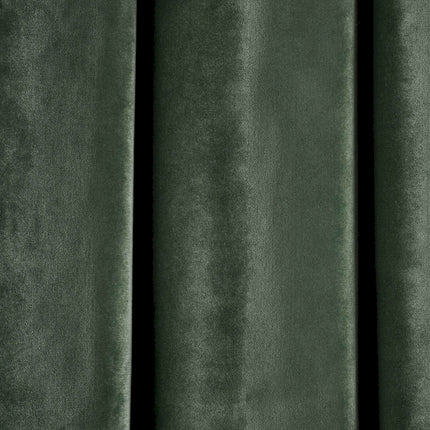 a close up of a green velvet curtain