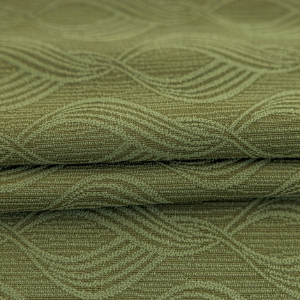 a close up view of a green fabric