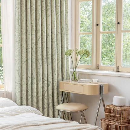 a bedroom with a bed, desk, and two windows
