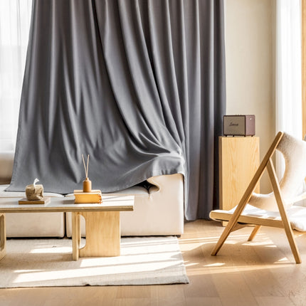 a living room with a couch and a table