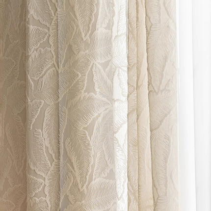 a close up of a curtain with a white background