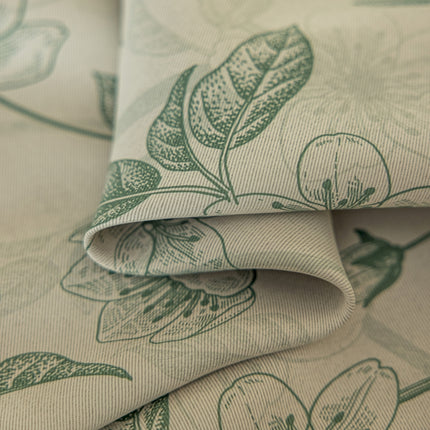 a close up of a fabric with flowers on it