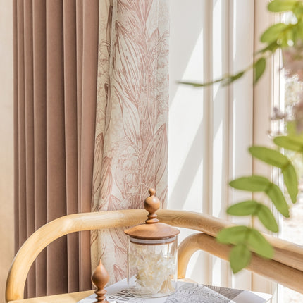 a wooden chair with a white table cloth on top of it