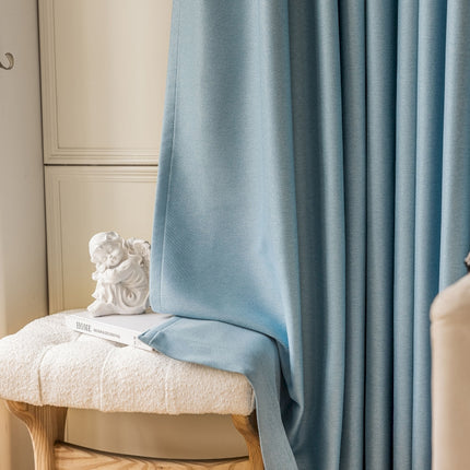 a chair with a towel on top of it