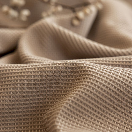 a close up of a fabric with a pattern