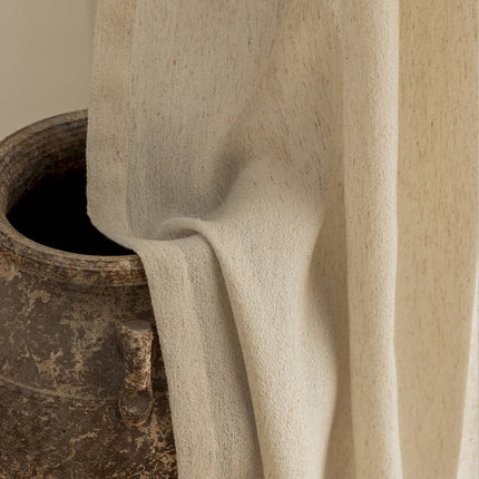 a close up of a cloth on a vase