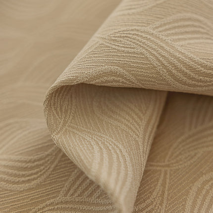 a close up view of a beige fabric