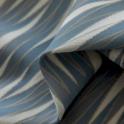 a close up of a blue and white striped fabric