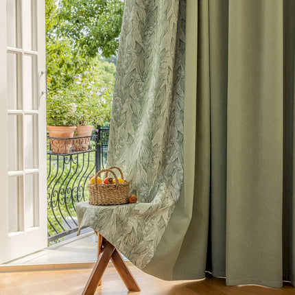 a basket of fruit sitting on a table in front of a window