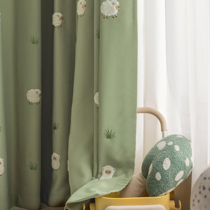a stuffed animal sitting on a chair next to a window