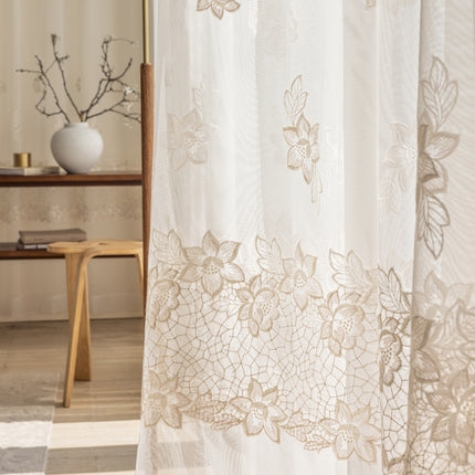 a bathroom with a shower curtain and a mirror
