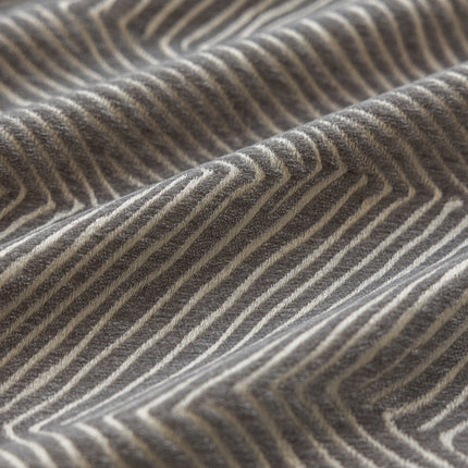 a close up of a fabric with a wavy pattern