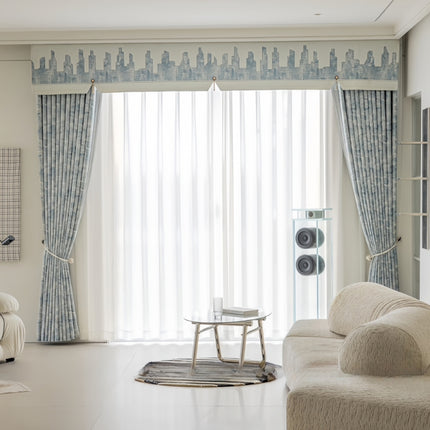 a living room filled with furniture and a large window