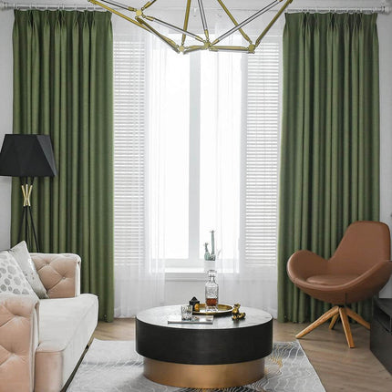 a living room filled with furniture and a chandelier