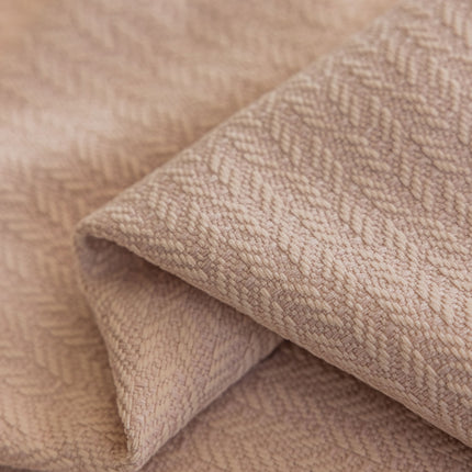 a close up of a blanket with a textured pattern