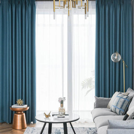 a living room filled with furniture and a chandelier