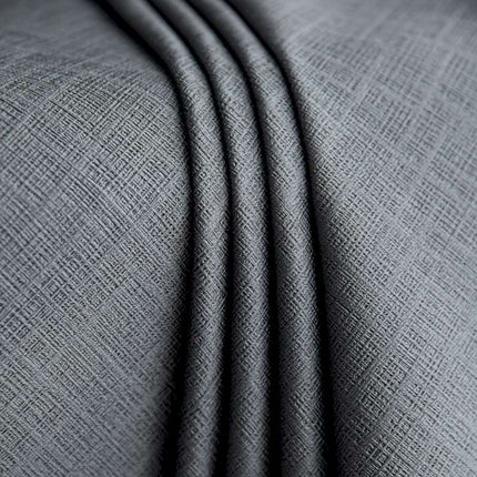 a close up shot of a grey fabric