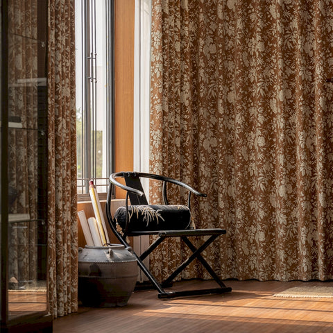 Brown tropical blackout curtain with foliage pattern
