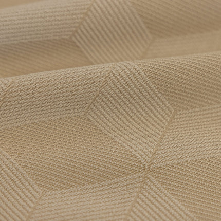a close up view of a beige fabric