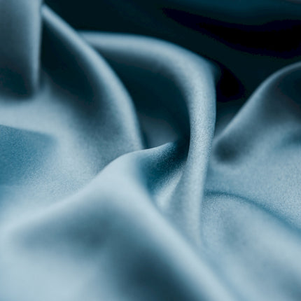 a close up view of a blue fabric