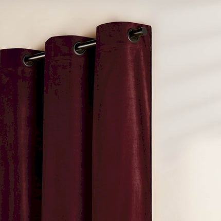 a close up of a curtain with a metal rod