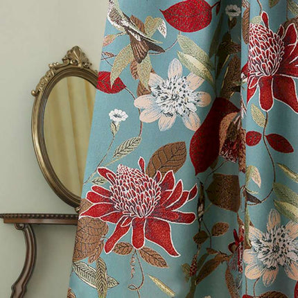a bathroom with a mirror and a curtain