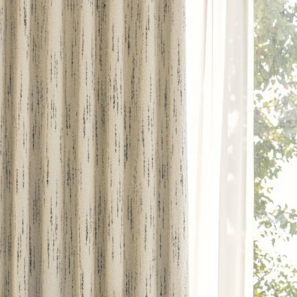 a window with a white curtain and a tree outside of it