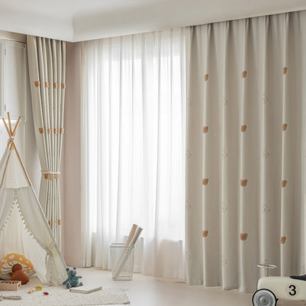 a child's room with a teepee tent and toys