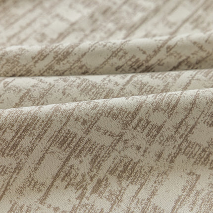 a close up of a white and brown fabric