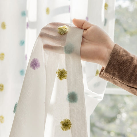 Colorful pompom curtains
