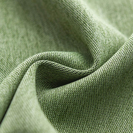 a close up view of a green fabric