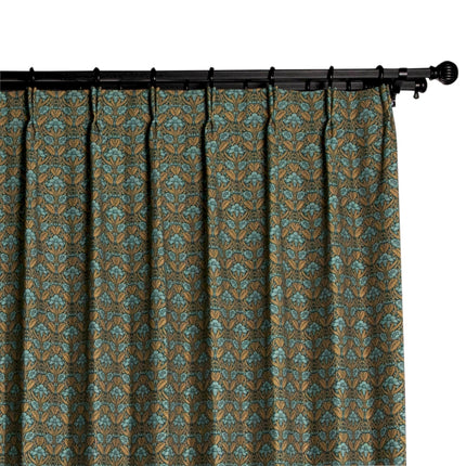 a close up of a curtain with a floral pattern