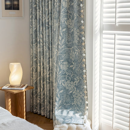 a bed room with a bed a lamp and a window