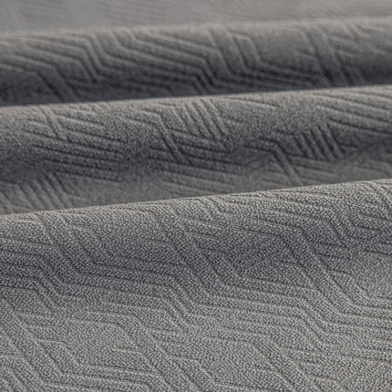 a close up view of a gray fabric