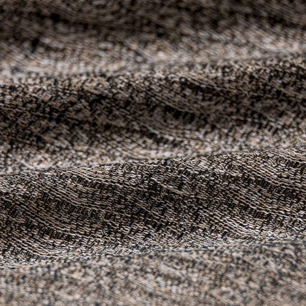 a close up of a black and white textured fabric