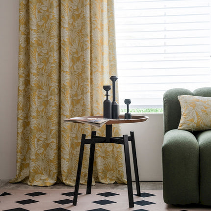 a living room with a couch and a table