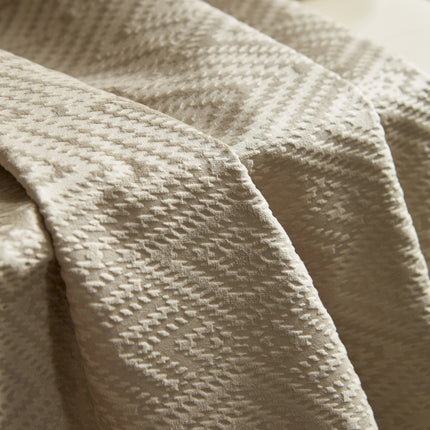 a close up of a textured white cloth