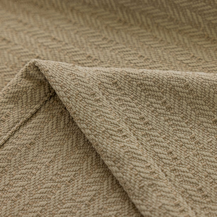 a close up of a tan colored fabric