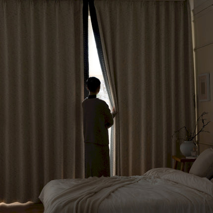 a person standing in front of a window