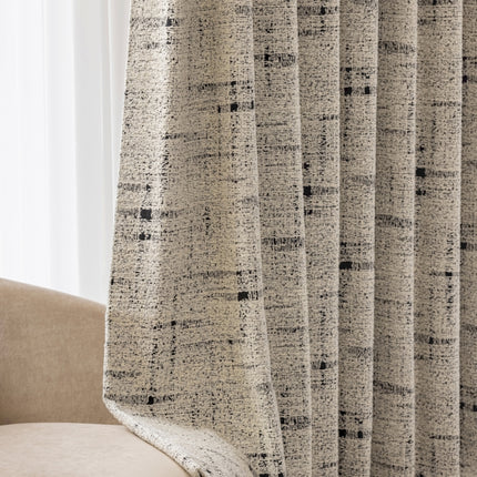 a close up of a curtain in a living room