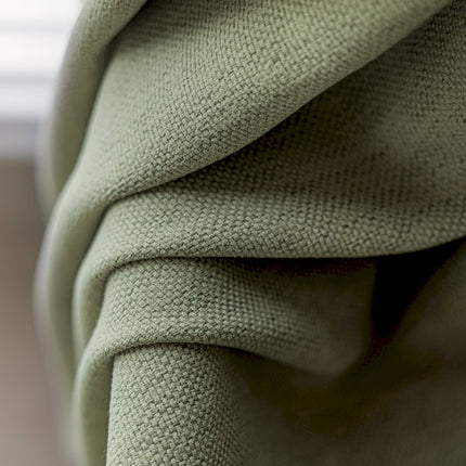 a close up view of a green cloth