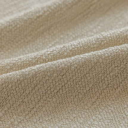 a close up view of a beige fabric