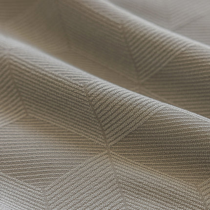 a close up view of a white fabric
