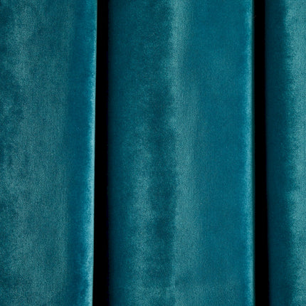 a close up of a blue curtain with a black background
