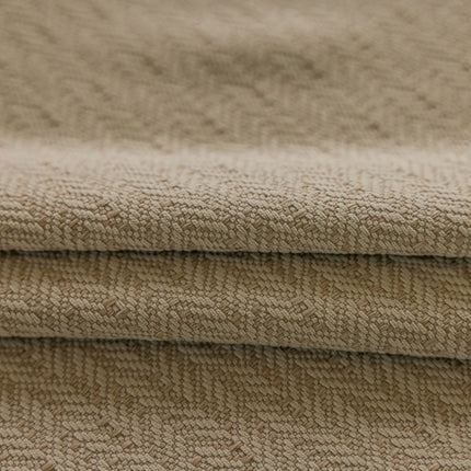 a close up of a blanket folded on top of each other