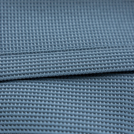 a close up view of a blue fabric
