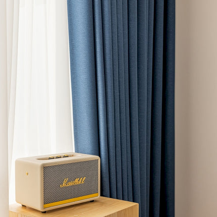 a radio sitting on top of a wooden table